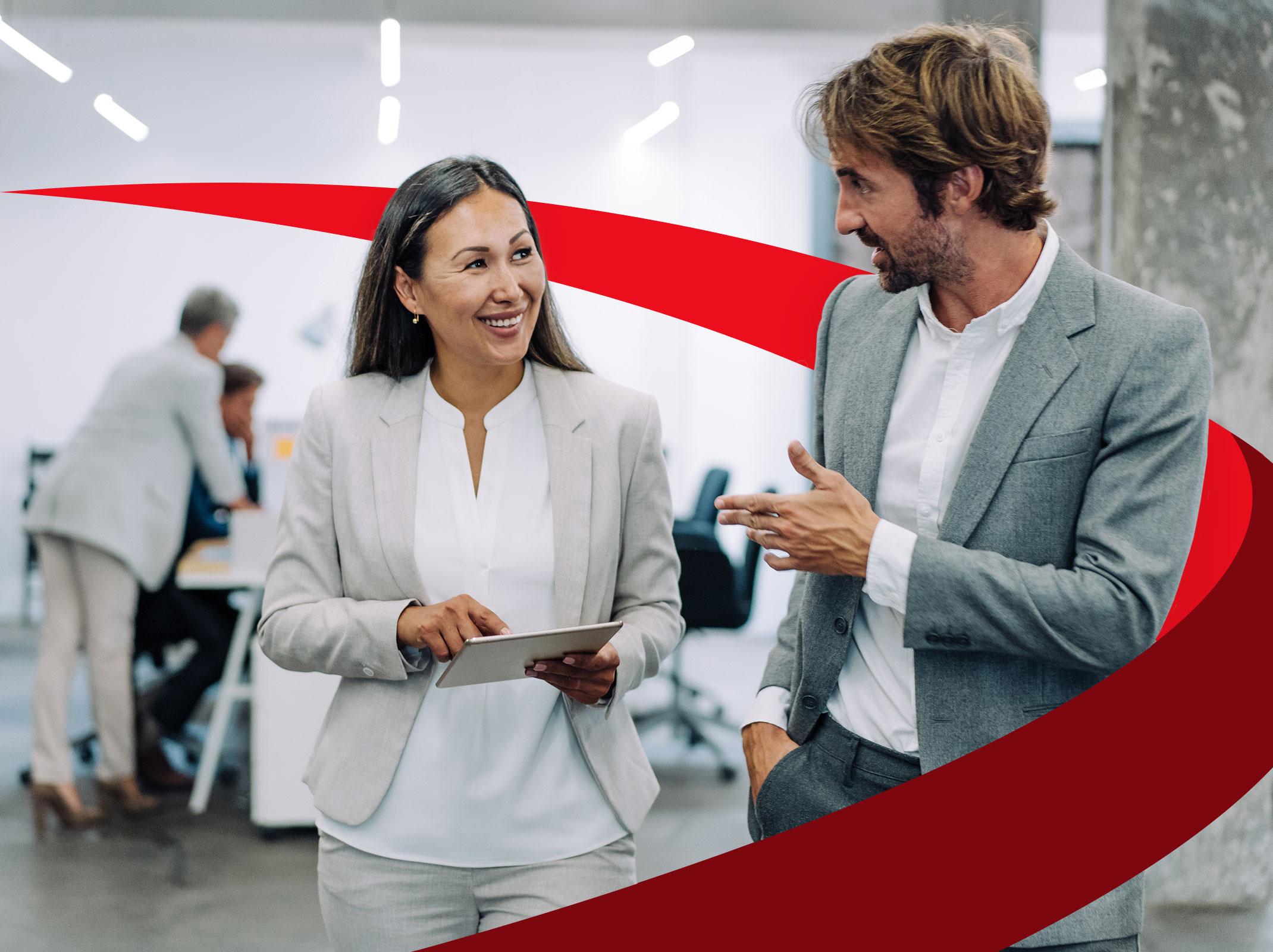 Intelligent male connecting with female coworker