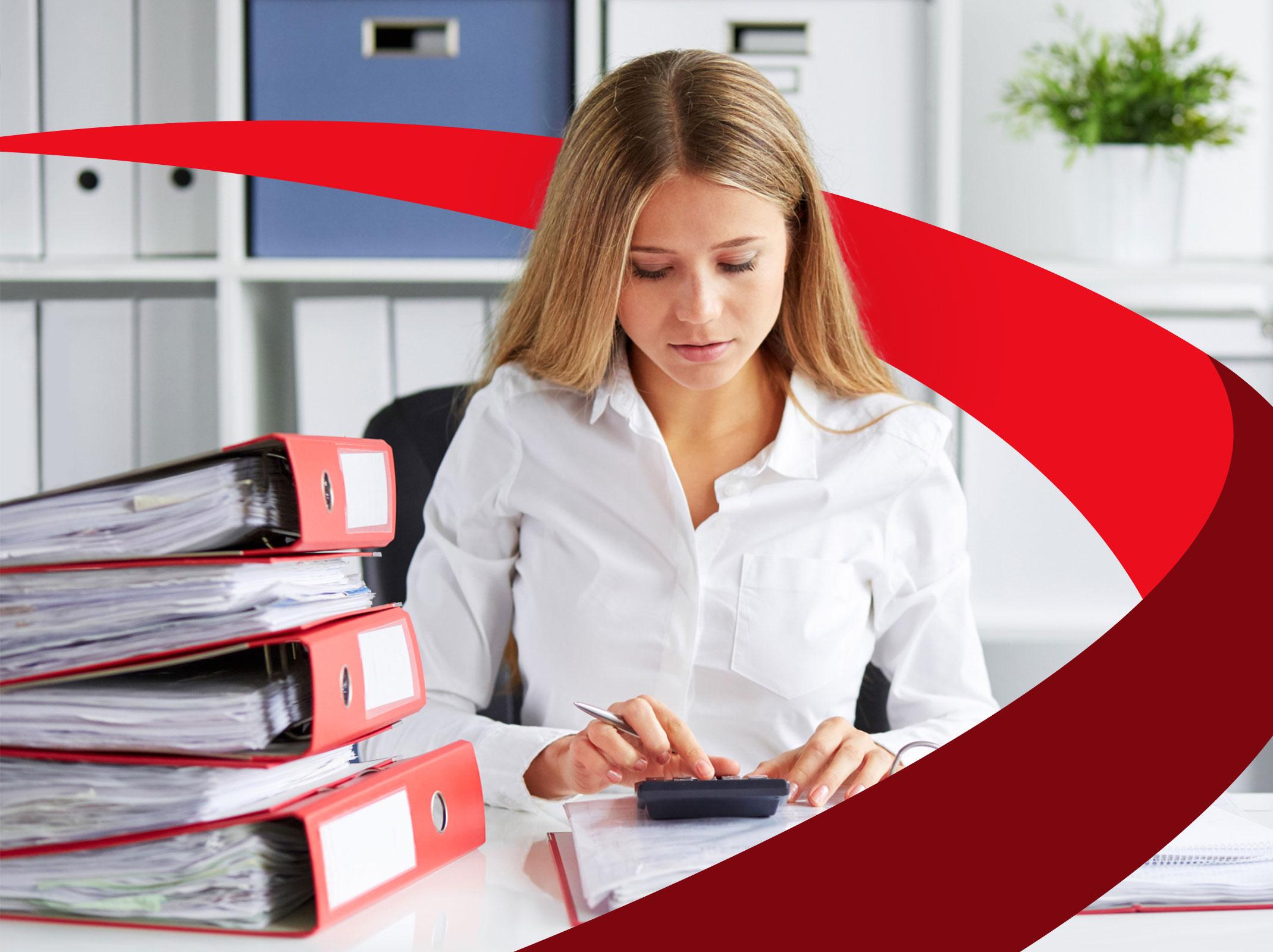 Business professional calculating payroll taxes