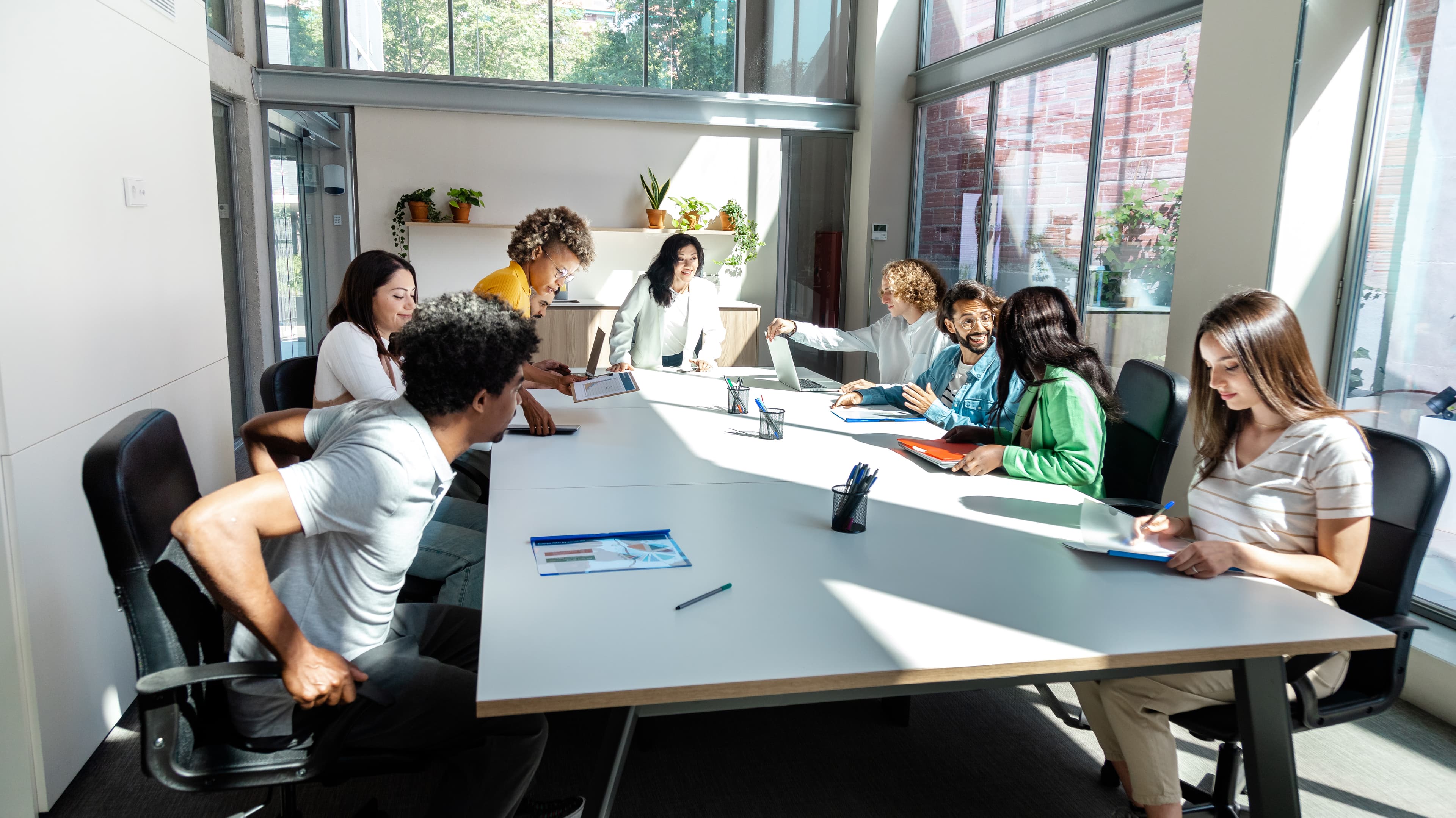 A group of people in a meeting